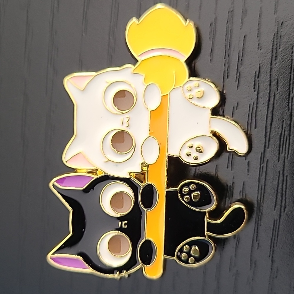Kitty with Broom Enamel Pin
